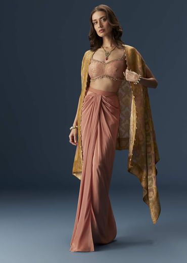 Rusty Pink Embroidered Blouse And Draped Skirt Set With Embellished Cape