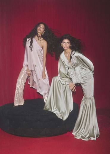 Sage Green Sharara Suit In Satin With A Peplum Top Featuring Plunging Neckline And Balloon Sleeves