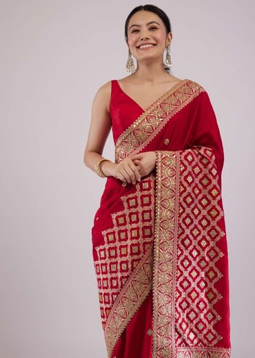 Maroon Red Dola Silk Saree With Intricate Embroidery