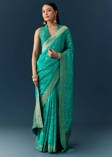 Sea Blue Dola Silk Saree with Woven Border and Unstitched Blouse