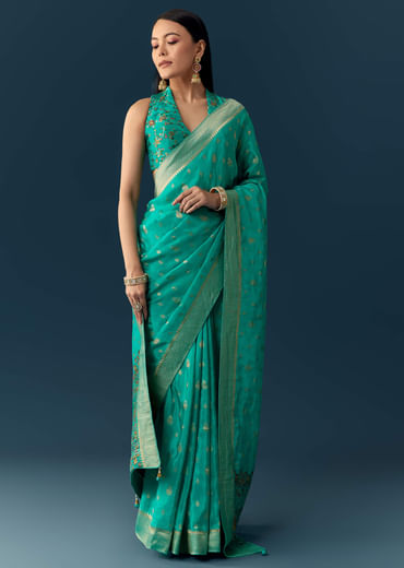 Sea Blue Dola Silk Saree with Woven Border and Unstitched Blouse