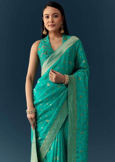 Sea Blue Dola Silk Saree with Woven Border and Unstitched Blouse