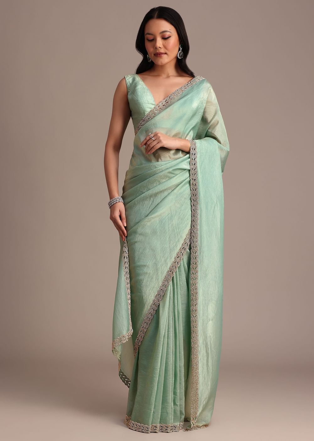 Sea Green Crushed Tissue Saree With Stone Embellished Border