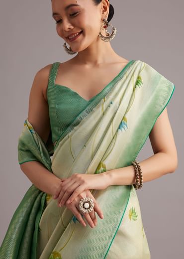 Sea Green Tissue Silk Floral Motif Saree With Contrast Pallu And Border