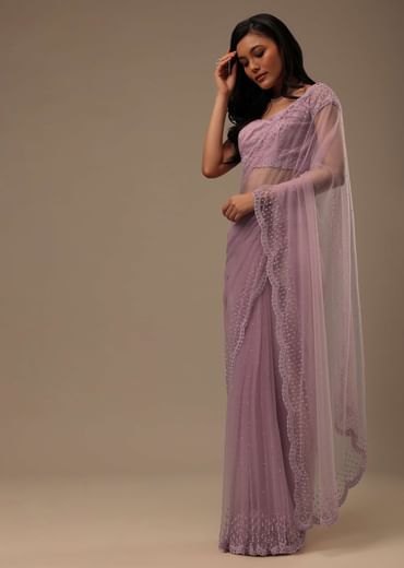 Lavender Pink Stone And Beads Embellished Net Saree