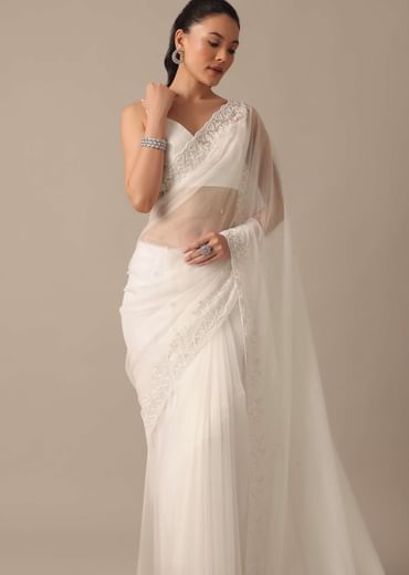 White Organza Saree With Bead Work Border And Unstitched Blouse Piece