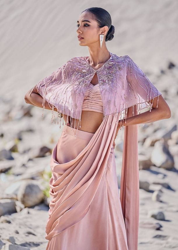 Beige Satin Draped Saree With Pleated Blouse And Embroidered Cape