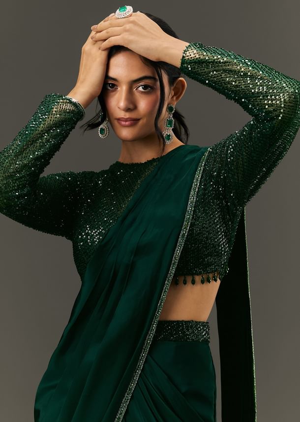 Bottle Green Pre Pleated Saree With Embroidered High Neck Full Sleeve Blouse Bottle Green Pre Pleated Saree With Embroidered High Neck Full Sleeve Blouse