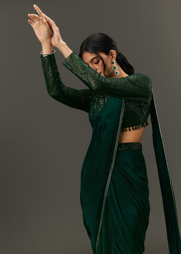Bottle Green Pre Pleated Saree With Embroidered High Neck Full Sleeve Blouse Bottle Green Pre Pleated Saree With Embroidered High Neck Full Sleeve Blouse