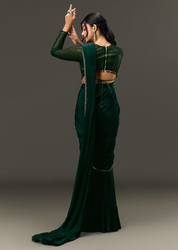 Bottle Green Pre Pleated Saree With Embroidered High Neck Full Sleeve Blouse Bottle Green Pre Pleated Saree With Embroidered High Neck Full Sleeve Blouse