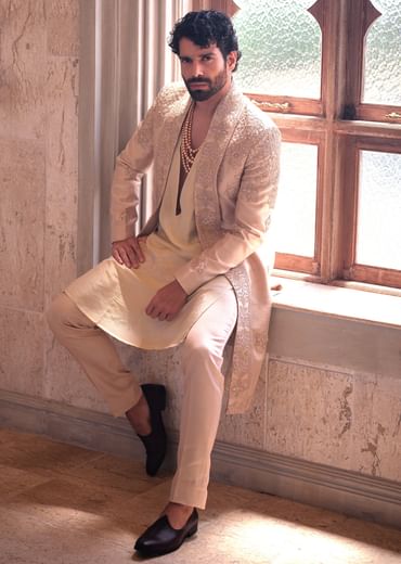 Gold Silk Sherwani For Groom With Regal Embroidery