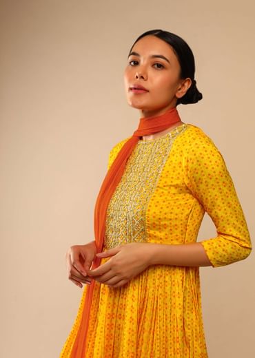 Honey Yellow Sharara Suit In Crepe With Bandhani And Lehariya Print Paired With Moti Embroidered Peplum Kurti