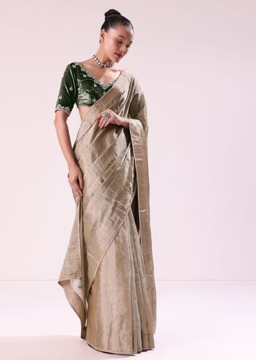 Silver Zari Tissue Saree With Embroidered Emerald Green Stitched Blouse