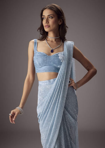 Sky Blue Shimmer Saree Paired With A Sweetheart Velvet Blouse