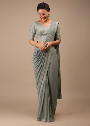 Slate Grey Lycra Blend Saree Finished In A Moroccan Jaal With Sequins Work And Cut Dana Floral Detailing