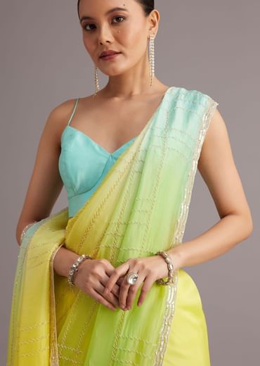 Soft Tissue Yellow Blue Shaded Saree Embroidered With Cutdana And Sequins