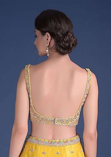 Sunset Yellow Blouse With Heavy Embossed Embroidery In Floral Butti Design