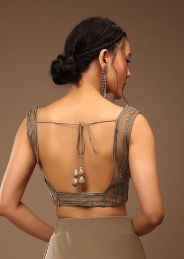 Taupe Grey Ready-Pleated Saree With A Crop Top In Foil Applique Embellishment Sleeveless With A Tie-Up Tassel Dori At The Back.