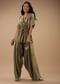 Tea Green Satin Peplum Top And Dhoti Pants With A Floral Print
