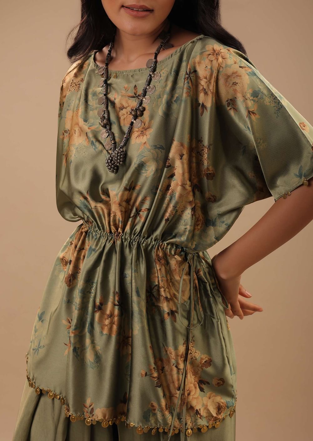 Tea Green Satin Peplum Top And Dhoti Pants With A Floral Print