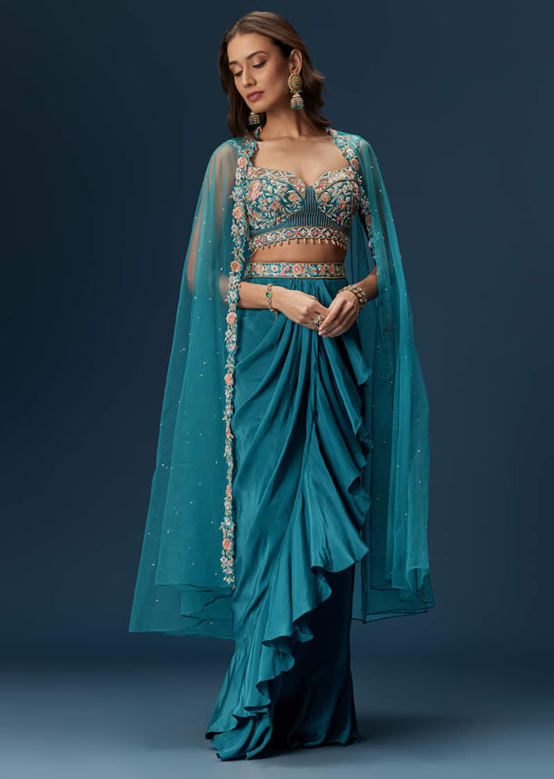 Teal Blue Dhoti Skirt Set With Embroidered Blouse And Net Dupatta Teal Blue Dhoti Skirt Set With Embroidered Blouse And Net Dupatta