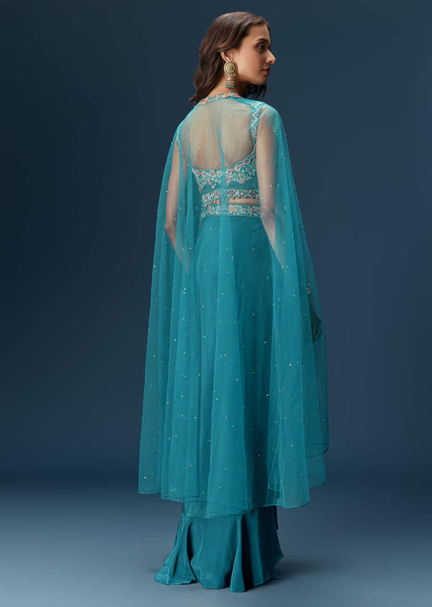 Teal Blue Dhoti Skirt Set With Embroidered Blouse And Net Dupatta Teal Blue Dhoti Skirt Set With Embroidered Blouse And Net Dupatta