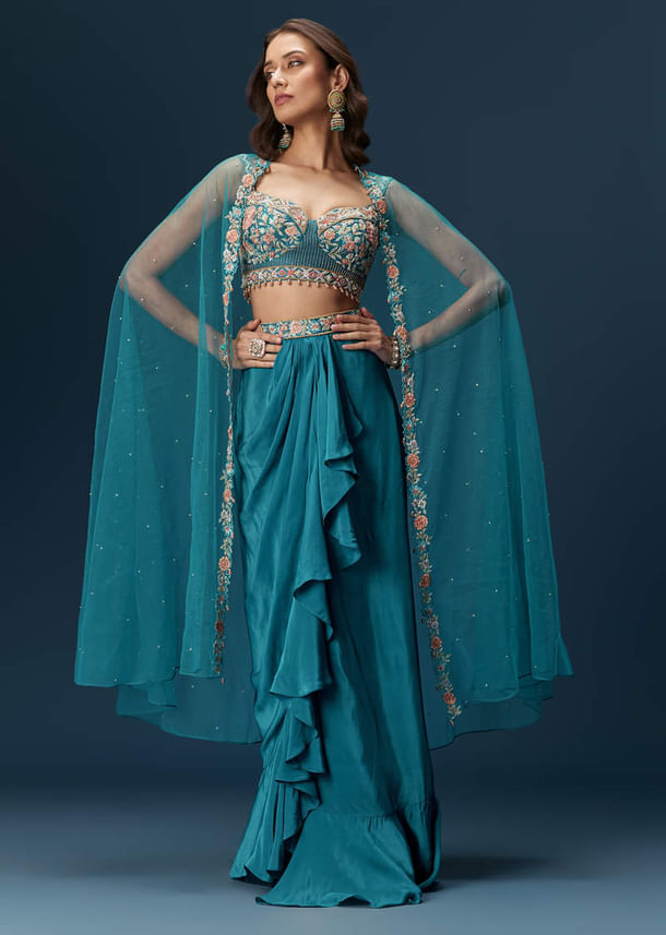 Teal Blue Dhoti Skirt Set With Embroidered Blouse And Net Dupatta Teal Blue Dhoti Skirt Set With Embroidered Blouse And Net Dupatta