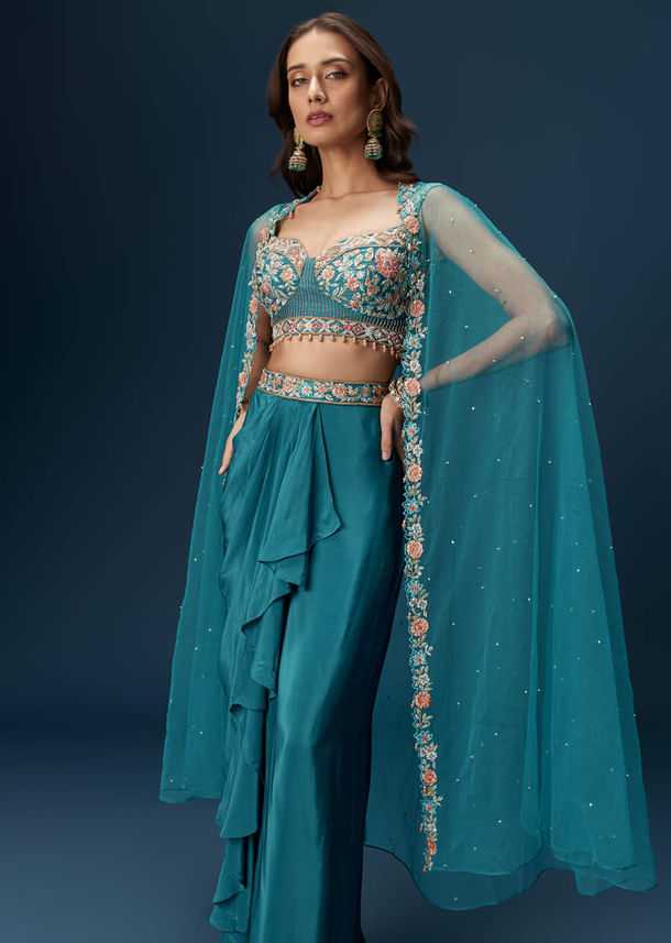 Teal Blue Dhoti Skirt Set With Embroidered Blouse And Net Dupatta Teal Blue Dhoti Skirt Set With Embroidered Blouse And Net Dupatta