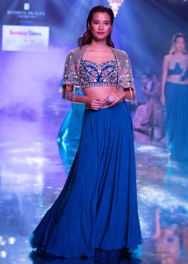 Seaside Blue Crop Top And Palazzo With Embossed Embroidery And Hand Crafted Cape Seaside Blue Crop Top And Palazzo With Embossed Embroidery And Hand Crafted Cape