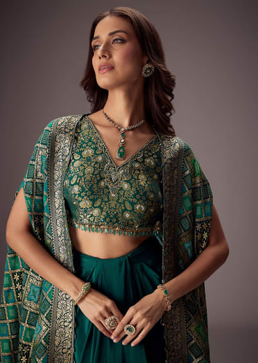 Teal Green Draped Skirt With Embroidered Blouse And Tassel Cape