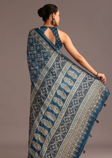 Teal Satin Ajrakh Print Saree With Mirror Embellished Border And Pallu