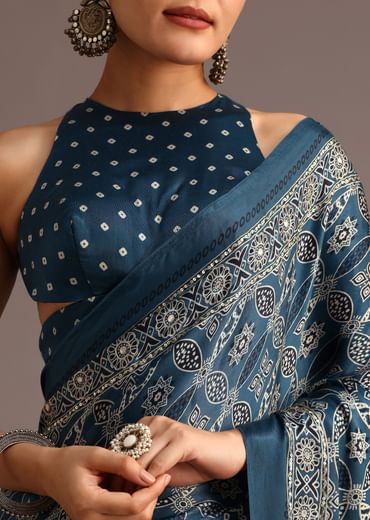 Teal Satin Ajrakh Print Saree With Mirror Embellished Border And Pallu