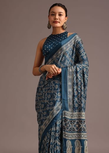 Teal Satin Ajrakh Print Saree With Mirror Embellished Border And Pallu