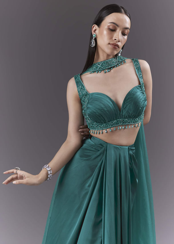 Teal Satin Crop Top And Drape Skirt Set With Heavy Embroidery Teal Satin Crop Top And Drape Skirt Set With Heavy Embroidery