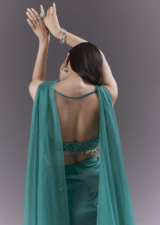 Teal Satin Crop Top And Drape Skirt Set With Heavy Embroidery Teal Satin Crop Top And Drape Skirt Set With Heavy Embroidery