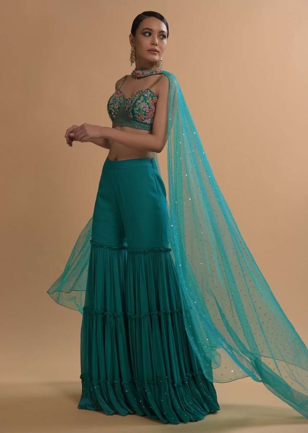 Teal Sharara And Crop Top Set With Colorful Resham, Cut Dana And Moti Embroidered Spring Blooms Teal Sharara And Crop Top Set With Colorful Resham, Cut Dana And Moti Embroidered Spring Blooms