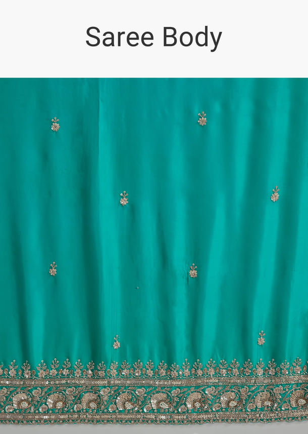 Turquoise Blue Satin Embroidered Saree With Heavy Hand Embroidery