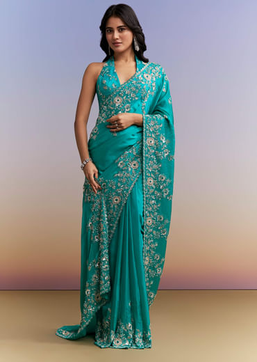 Turquoise Blue Satin Saree With Heavy Embroidered Details