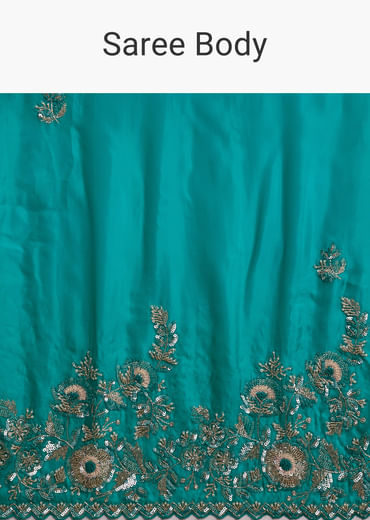 Turquoise Blue Satin Saree With Heavy Embroidered Details