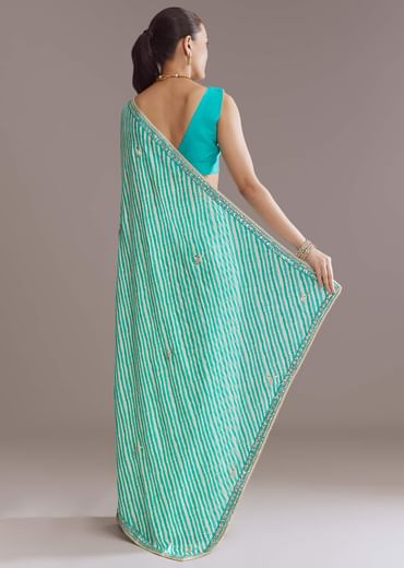Turquoise Blue Chinon Saree With Leheriya And Gota Work