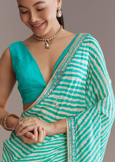 Turquoise Blue Chinon Saree With Leheriya And Gota Work