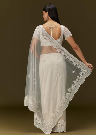 White Net Saree With All Over Embroidery