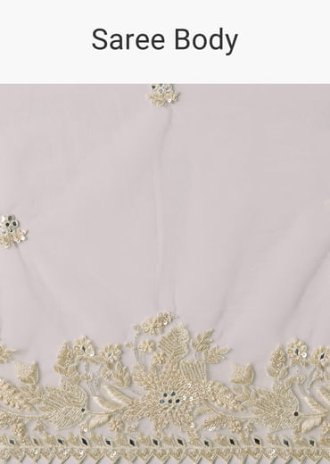 White Net Saree With All Over Heavy Embroidery