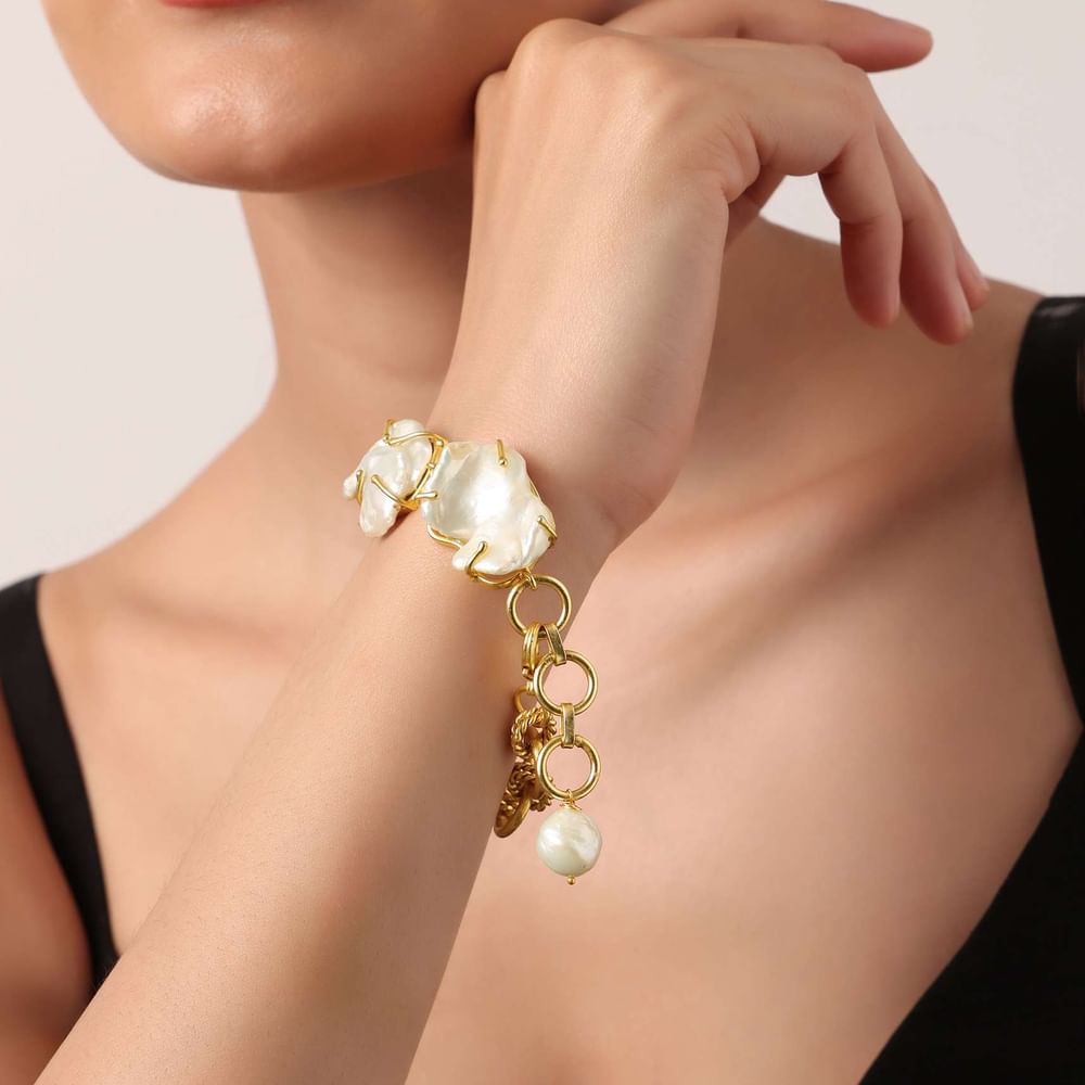 White And Gold Finish Bracelet With Mother Of Pearls