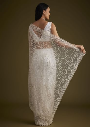 White Net Saree With Sequins And Stones Embroidery