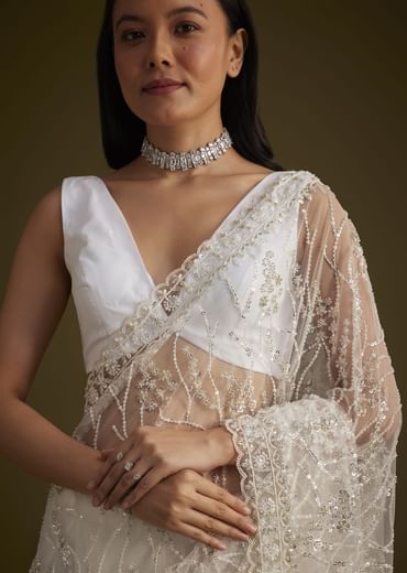 White Net Saree With Sequins And Stones Embroidery