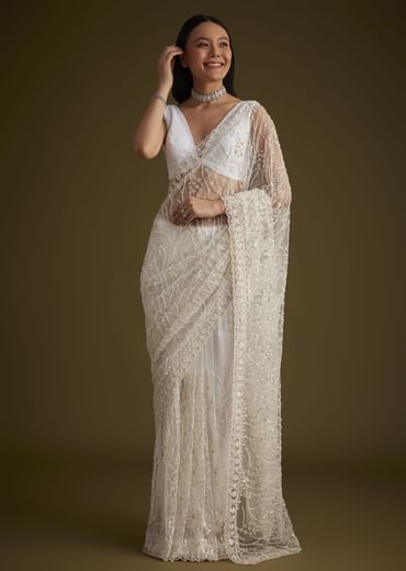 White Net Saree With Sequins And Stones Embroidery