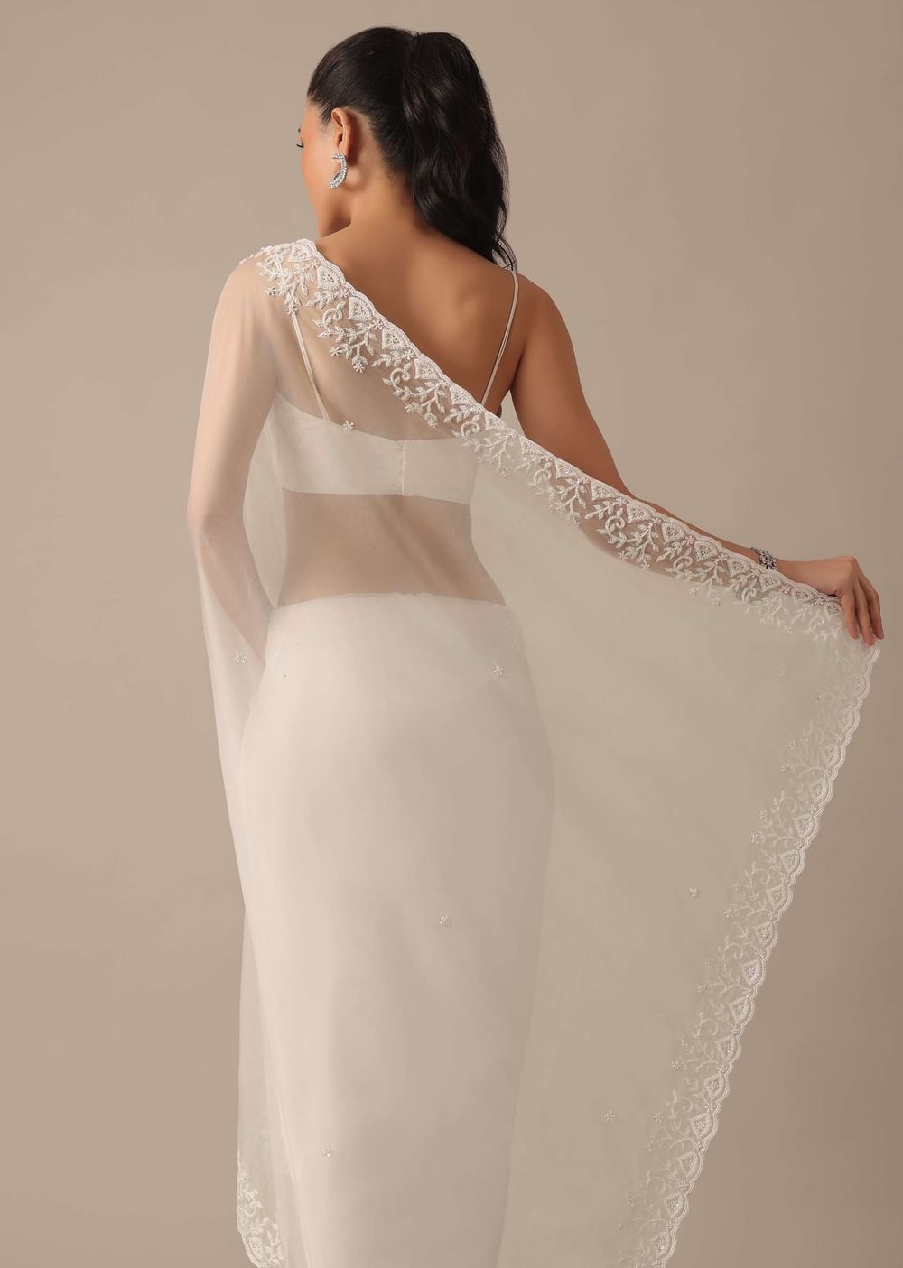 White Organza Saree With Bead Work Border And Unstitched Blouse Piece
