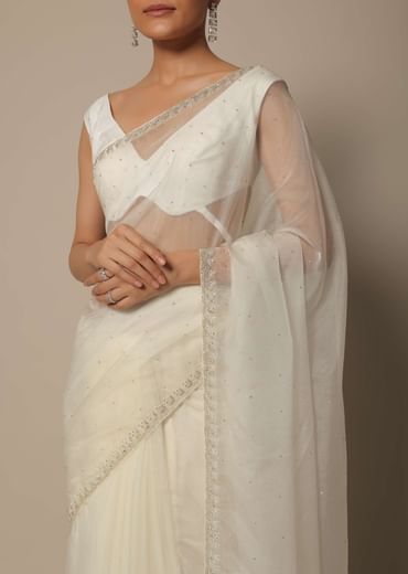 White Organza Saree With Scallop Cutdana Border And Unstitched Blouse Piece