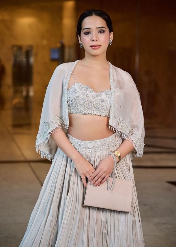 White Ruched Lehenga With Spaghetti Blouse And Cape